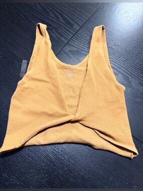Urban Outfitters Ribbed Twist-Front Cropped Bodysuit in Mustard
